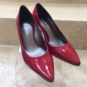 Red patent leather pumps